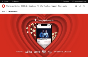 Vodafone VeryMe Rewards graphic showing the app on a phone, ringed by partner logos including Caffè Nero, Odeon, Sainsbury’s, Kids Pass and Fortnum & Mason